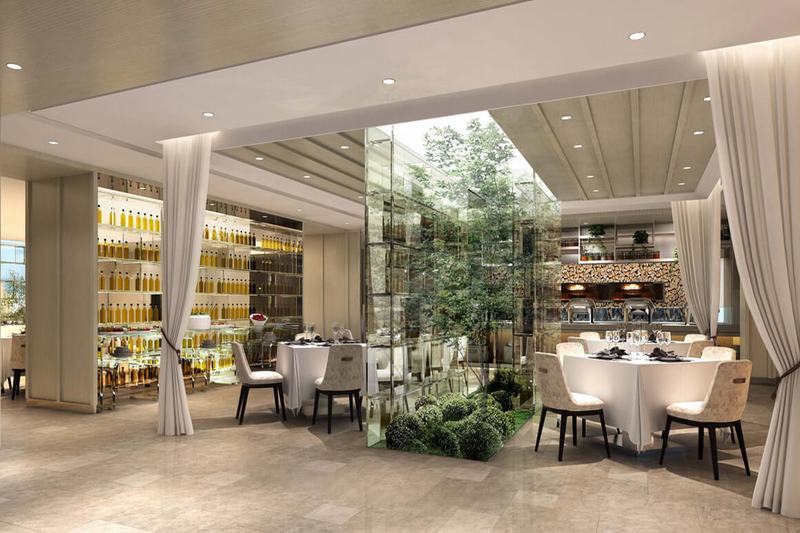 Caesar Park Hotel Banqiao Taipei Exterior photo The photo shows a modern restaurant interior. There are elegant round tables set for dining, adorned with white tablecloths and fine dining chairs. A glass wall features greenery, creating a serene atmosphere with a touch of nature inside. On one sid